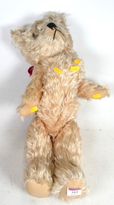 Lot 514 - A 1960s teddy-bear pyjama case, having jointed...