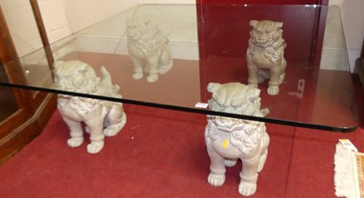 Lot 1160 - A contemporary heavy plate glass topped square...