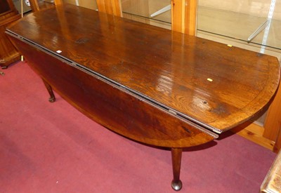 Lot 1166 - A contemporary joined oak and burr oak...