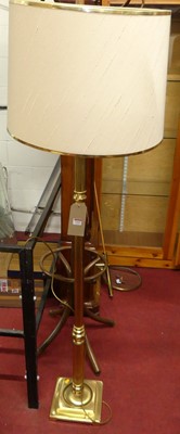 Lot 1169 - A turned and reeded brass standard lamp with...
