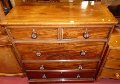 Lot 1179 - A mid-Victorian mahogany chest of two short...