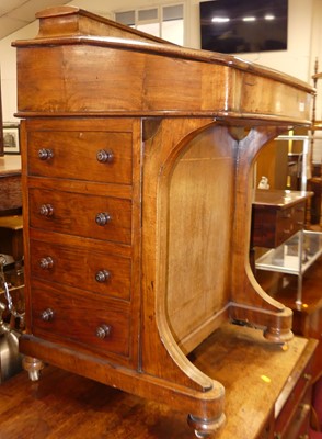 Lot 1182 - A mid-Victorian figured walnut slopefront...