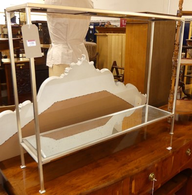 Lot 1186 - A contemporary silvered metal framed two-tier...