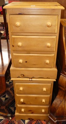 Lot 1208 - A pair of contemporary pine three-drawer...