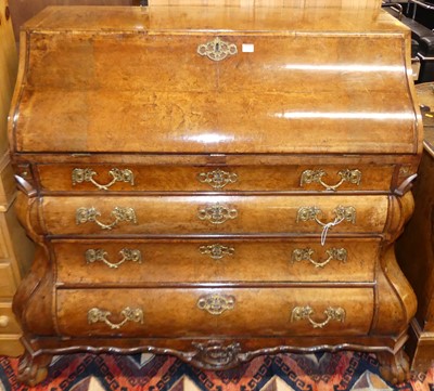 Lot 1209 - An 18th century Dutch figured walnut bombe...