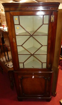 Lot 1190 - A contemporary mahogany freestanding corner...