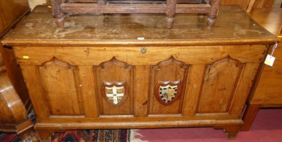 Lot 1211 - A joined oak hinged top four panelled coffer...