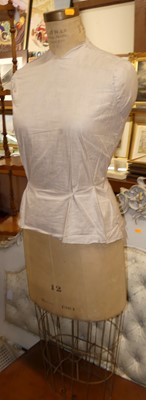 Lot 1194 - Two early 20th century vintage tan leather...