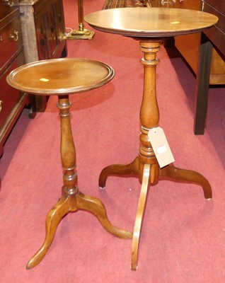 Lot 1195 - Two mahogany circular fixed top pedestal...