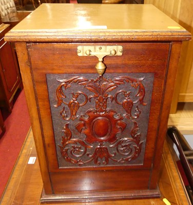 Lot 1221 - A late Victorian relief carved walnut coal...