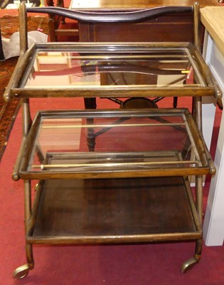 Lot 1228 - A French stained beech three-tier drinks...