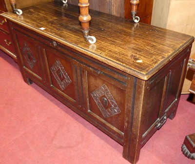 Lot 1205 - An 18th century joined oak three-panel hinge...