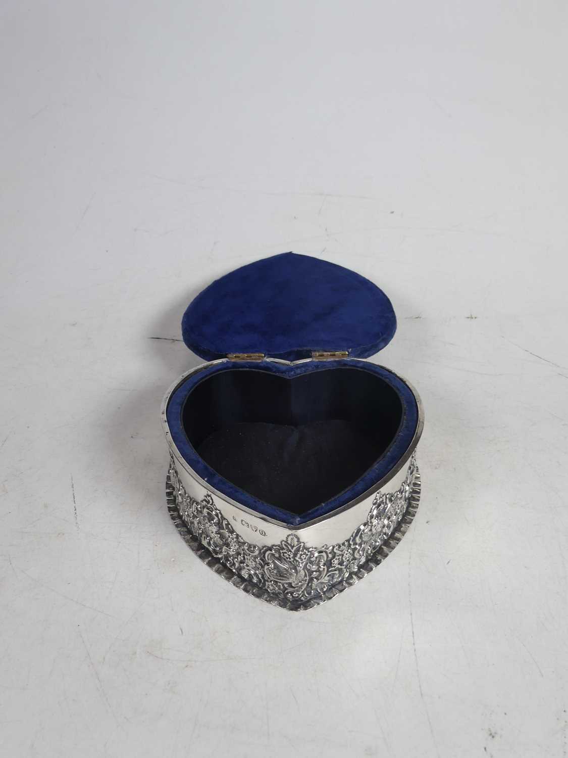 Lot 210 - A late Victorian silver and embossed...