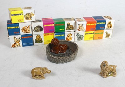 Lot 519 - A collection of Wade Whimsies, in original...