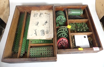 Lot 524 - A collection of vintage Meccano, housed in two...