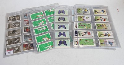 Lot 482 - A collection of cigarette cards, to include...