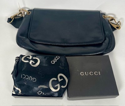 Lot 490 - A lady's Gucci scarf, in original box;...