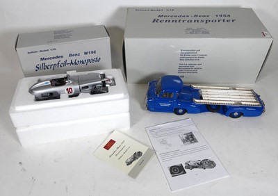 Lot 476 - A CMC 1:18 scale car transporter and car group,...