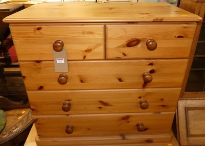 Lot 1245 - A contemporary pine round cornered chest of...