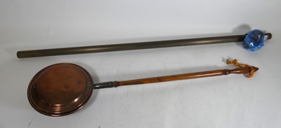 Lot 460 - A copper warming pan; and a brass curtain pole,...