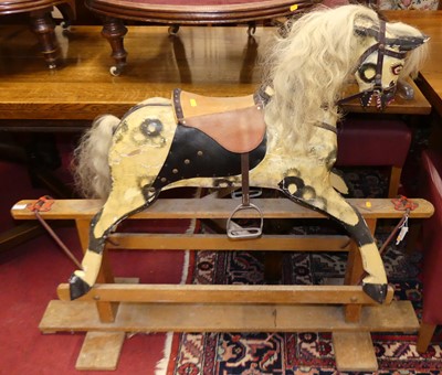 Lot 1253 - A vintage child's dapple grey painted rocking...