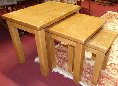 Lot 1260 - A contemporary blond oak nest of three...