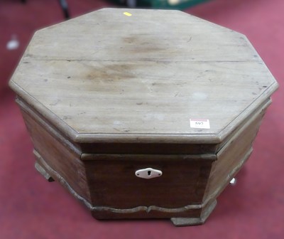 Lot 597 - An octagonal wooden trunk
