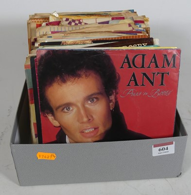 Lot 604 - A collection of assorted 7" singles and EPs,...