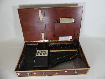Lot 582 - A continental autoharp in wooden case, length...