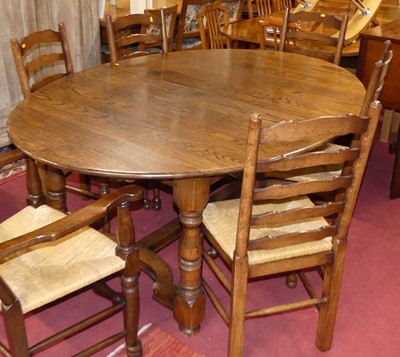 Lot 1262 - A contemporary joined oak dining suite by...