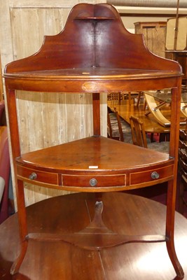 Lot 1268 - An early 19th century mahogany bowfront corner...