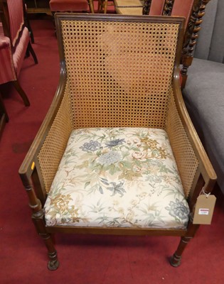 Lot 1289 - A mahogany and cane inset single bergere chair...