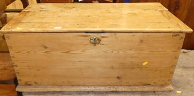 Lot 1310 - A rustic pine hinge topped tool chest, having...