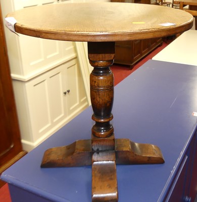 Lot 1319 - A contemporary joined oak circular fixed top...