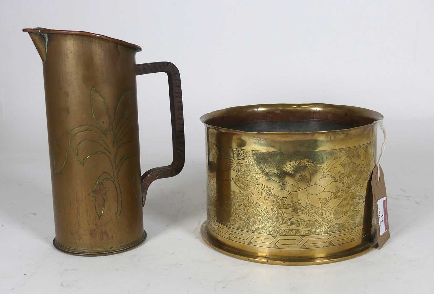 Lot 34 - A German brass trench art, mortar shell case,...