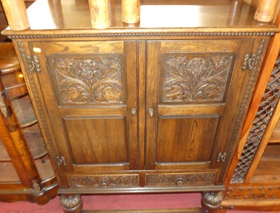 Lot 1322 - A contemporary joined oak double door side...
