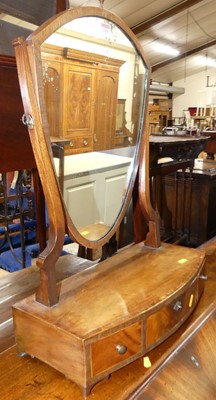 Lot 1325 - A 19th century mahogany shield shaped swing...