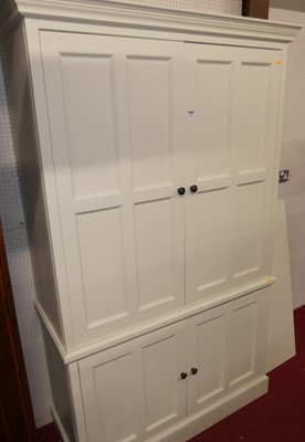 Lot 1337 - A contemporary white wood four-door pantry...