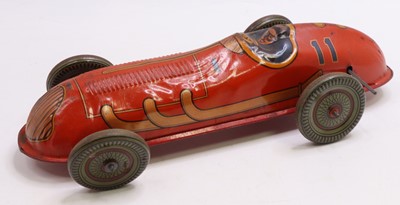 Lot 1846 - Mettoy tinplate and clockwork racing car, red...
