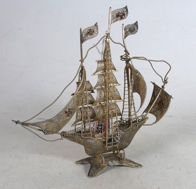 Lot 425 - A filigree gilt and enamelled desk model of a...