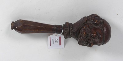 Lot 440 - A Black Forest carved treen nutcracker 18cm
