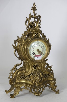 Lot 96 - A continental, gilt metal Rococo style mantel...