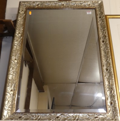 Lot 1093 - A silvered framed and bevelled rectangular...