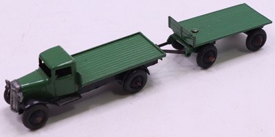 Lot 1091 - Dinky 25t Flat Truck, finished in green, black...