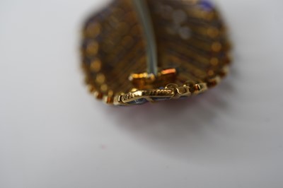Lot 2651 - A Cartier 18ct gold stylised leaf brooch...