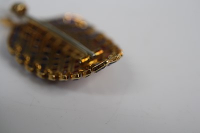 Lot 2651 - A Cartier 18ct gold stylised leaf brooch...