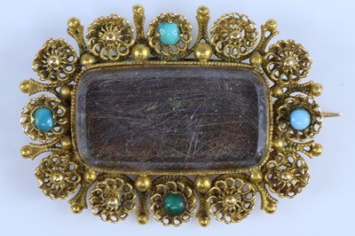 Lot 352 - A late Victorian yellow metal memorial brooch...