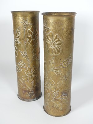Lot 757 - A pair of WW I trench art shell case vases,...