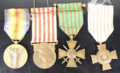 Lot 675 - A group of four French medals to include WW I...