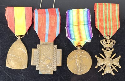 Lot 728 - A collection of four medals, to include WW I...